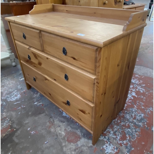 1143 - A modern pine chest of drawers - approx. 81cm high x 95cm wide x 49cm deep