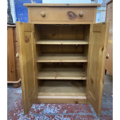 1144 - A modern pine cabinet - approx. 90cm high x 61cm wide x 46cm deep