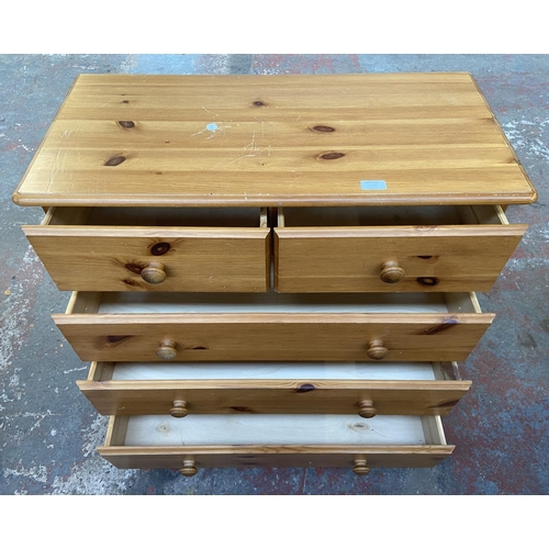 1145 - A modern pine chest of drawers - approx. 75cm high x 83cm wide x 38cm deep