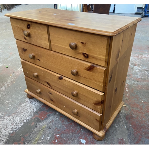 1145 - A modern pine chest of drawers - approx. 75cm high x 83cm wide x 38cm deep