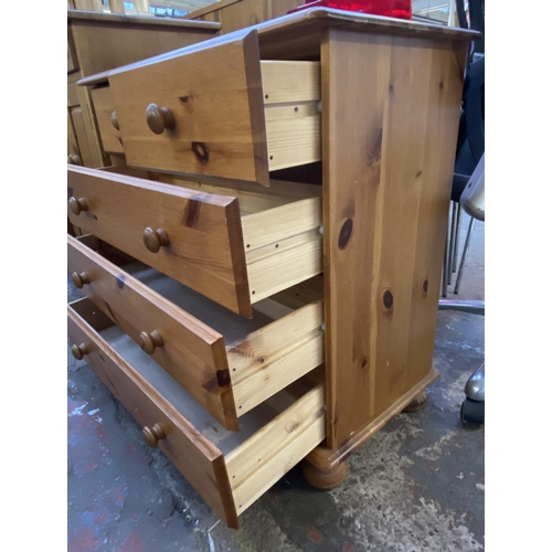 1145 - A modern pine chest of drawers - approx. 75cm high x 83cm wide x 38cm deep