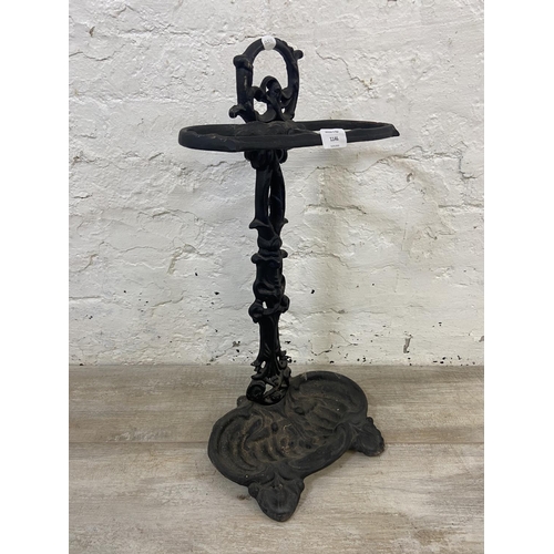 1146 - A Victorian style cast iron two section stick stand - approx. 58cm high