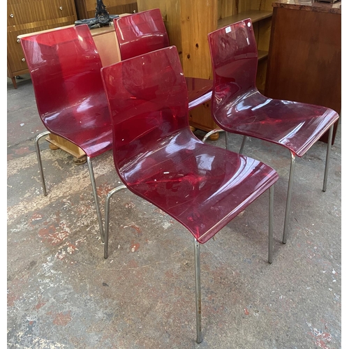 1148 - Four Italian red acrylic and chrome plated stacking dining chairs