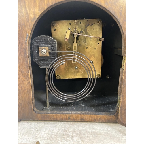 1151 - Two antique mantel clocks, one Art Deco British made Coronet oak and ebonised cased with pendulum an... 