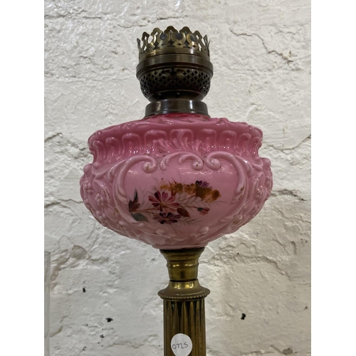 1158 - A Victorian Duplex brass oil lamp with hand painted pink glass reservoir, etched glass shade and cle... 