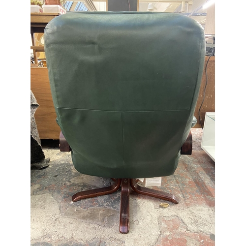 1167 - A Stressless style green leather and bentwood swivel armchair and two footstools