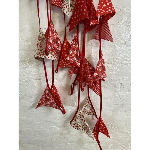 1171 - A quantity of floral and polka dot fabric bunting