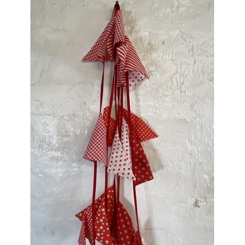 1171 - A quantity of floral and polka dot fabric bunting