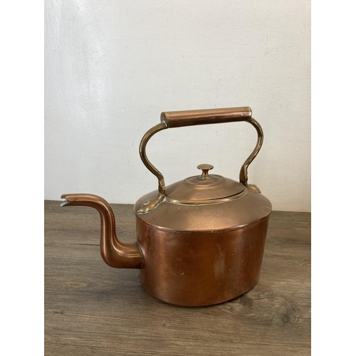 1308 - Two Victorian copper kettles - largest approx. 28cm high