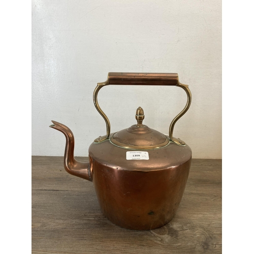 1309 - Two Victorian copper kettles with acorn finials - largest approx. 33cm high