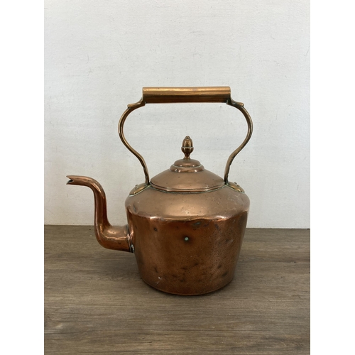 1309 - Two Victorian copper kettles with acorn finials - largest approx. 33cm high