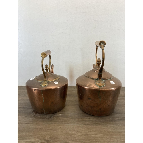 1309 - Two Victorian copper kettles with acorn finials - largest approx. 33cm high