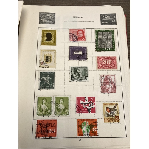 1403 - Nine albums containing stamps