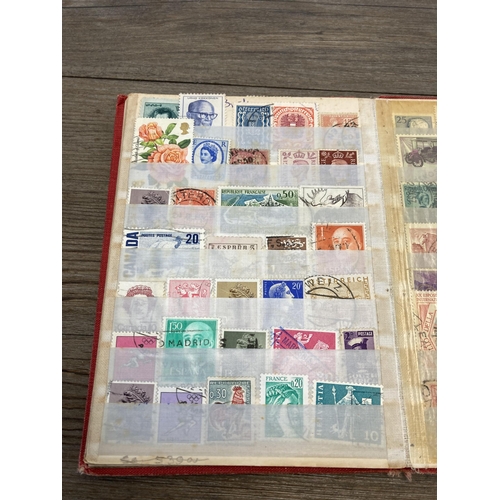 1403 - Nine albums containing stamps