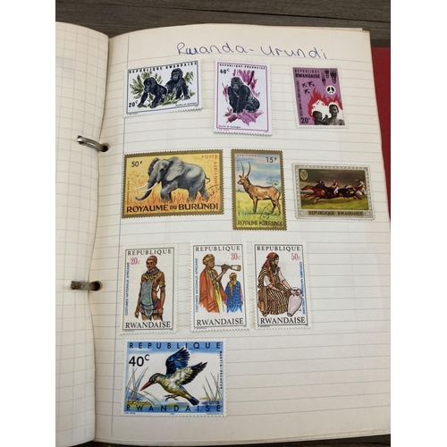 1403 - Nine albums containing stamps