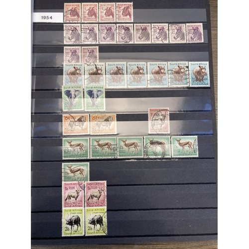 1406 - Eight albums containing worldwide stamps and First Day Covers