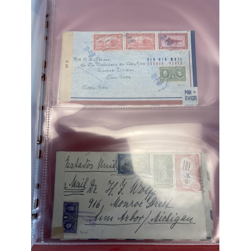 1407 - An album containing 19th century and later United States stamped postal envelopes and First Day Cove... 