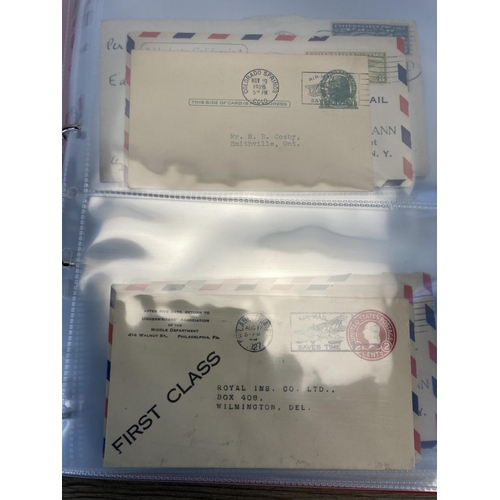 1407 - An album containing 19th century and later United States stamped postal envelopes and First Day Cove... 