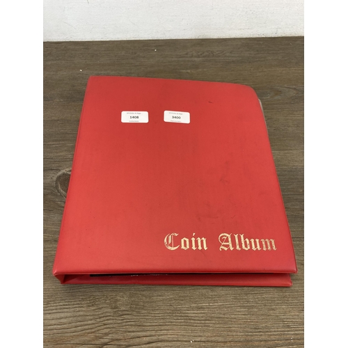 1408 - A coin album containing world coins to include silver examples