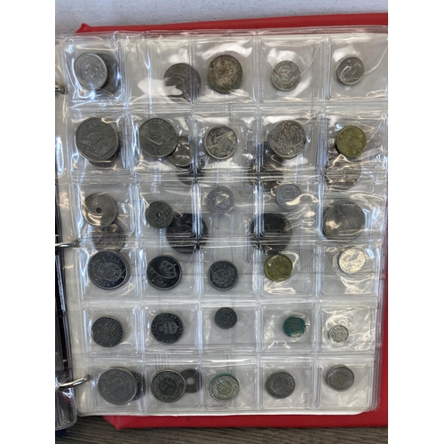 1408 - A coin album containing world coins to include silver examples