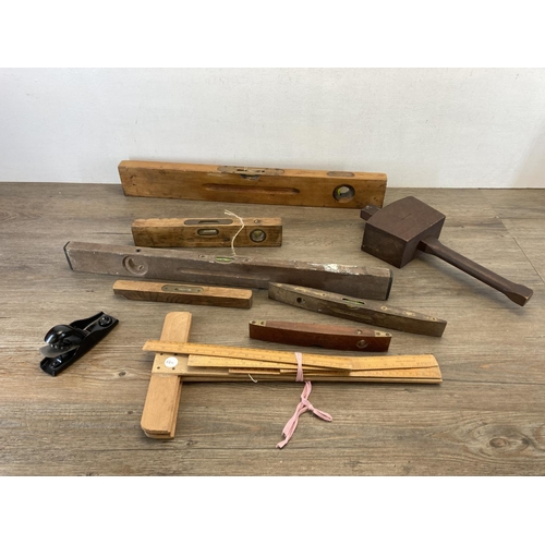 1412 - A collection of vintage tools and measuring equipment to include J. Rabone & Sons of Birmingham beec... 