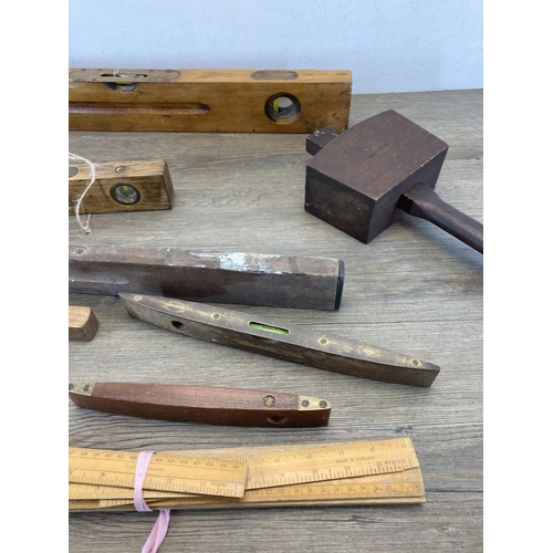 1412 - A collection of vintage tools and measuring equipment to include J. Rabone & Sons of Birmingham beec... 