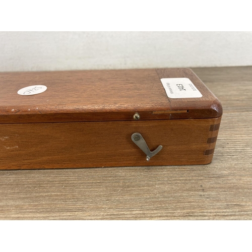 1413 - A mahogany cased U.W.W. Makers of Birmingham brass marine navigation rolling rule - approx. 46cm wid... 