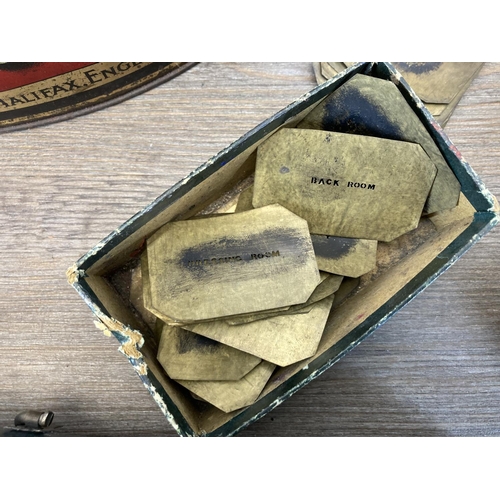 1414 - A collection of items to include WWII British Civil Defence warden's helmet, late 19th century brass... 