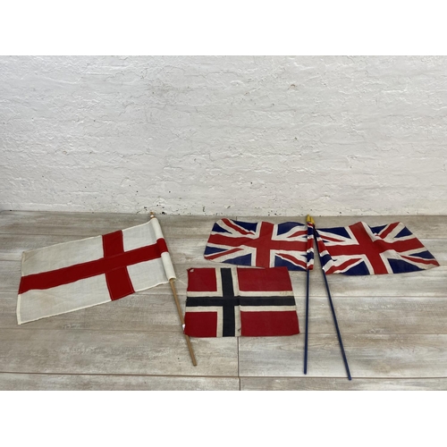 1434 - Four flags, two Union Jacks, one St George's Cross and one Norwegian - largest approx. 46cm high x 9... 