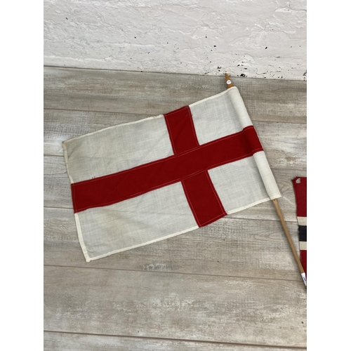 1434 - Four flags, two Union Jacks, one St George's Cross and one Norwegian - largest approx. 46cm high x 9... 