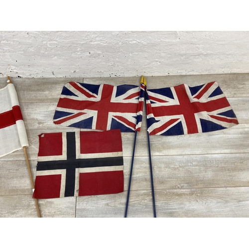 1434 - Four flags, two Union Jacks, one St George's Cross and one Norwegian - largest approx. 46cm high x 9... 