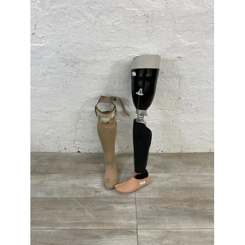 1435 - Two prosthetic legs - largest approx. 86cm high