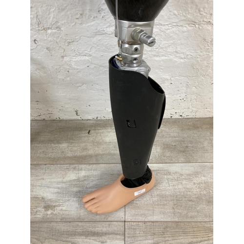 1435 - Two prosthetic legs - largest approx. 86cm high