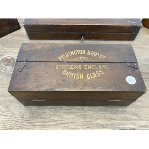 1438 - Four wooden boxes, one 19th century R. Adams mahogany gun case, one Pilkington Bros Ltd of St Helens... 