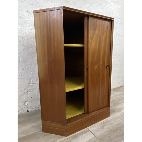 1173 - A mid 20th century teak corner cabinet - approx. 97cm high x 82cm wide x 57cm deep