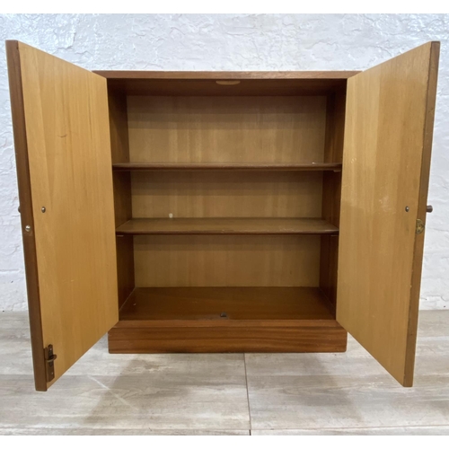 1175 - A mid 20th century walnut cabinet - approx. 78cm high x 69cm wide x 28cm deep