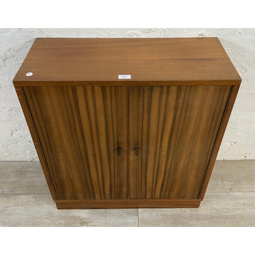 1175 - A mid 20th century walnut cabinet - approx. 78cm high x 69cm wide x 28cm deep