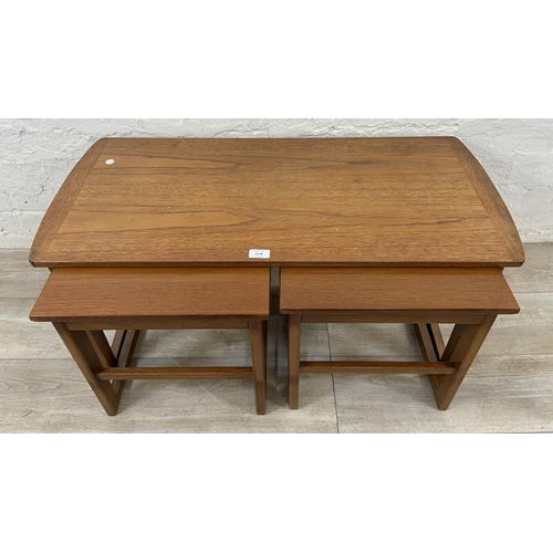 1178 - A mid 20th century teak nest of three tables - approx. 41cm high x 92cm wide x 43cm deep