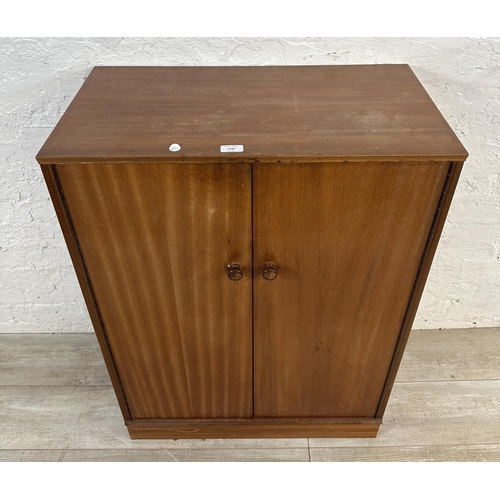 1181 - A mid 20th century teak cabinet - approx. 98cm high x 70cm wide x 37cm deep