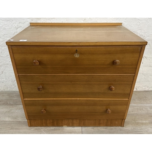 1183 - A mid 20th century Golden Key walnut chest of drawers - approx. 72cm high x 77cm wide x 45cm deep