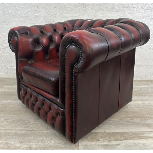 1188 - An oxblood leather Chesterfield club chair - approx. 80cm high x 100cm wide x 86cm deep