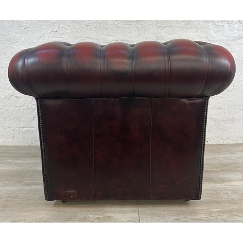 1188 - An oxblood leather Chesterfield club chair - approx. 80cm high x 100cm wide x 86cm deep