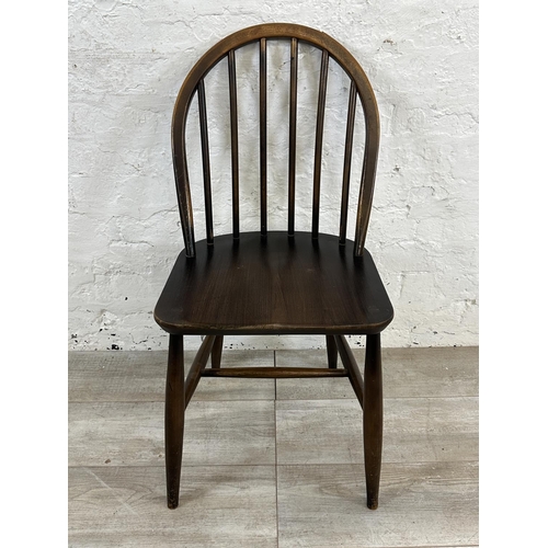 1189 - Four mid 20th century Ercol elm and beech Windsor dining chairs