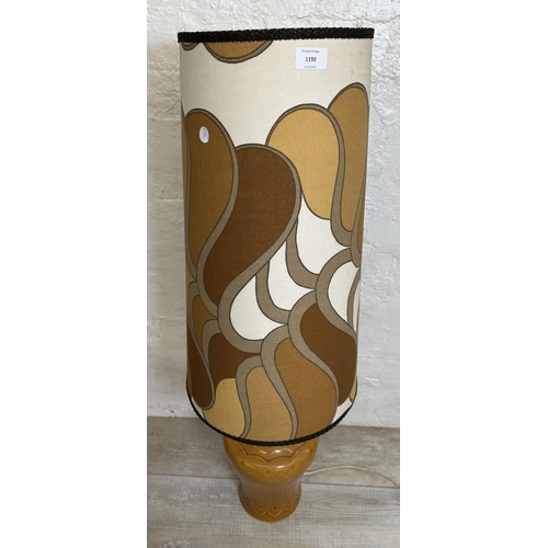 1190 - A mid 20th century brown glazed ceramic table lamp with fabric shade - approx. 106cm high including ... 