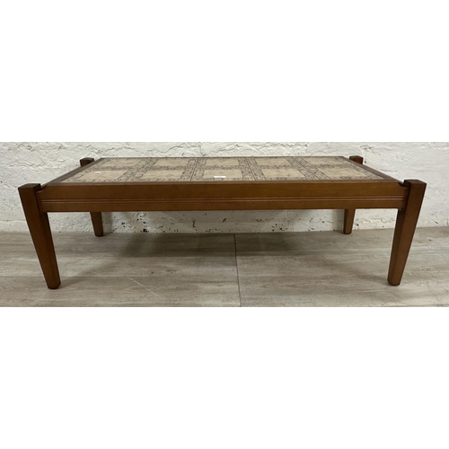 1191 - A mid 20th century teak and ceramic tile top coffee table - approx. 37cm high x 47cm wide x 122cm lo... 