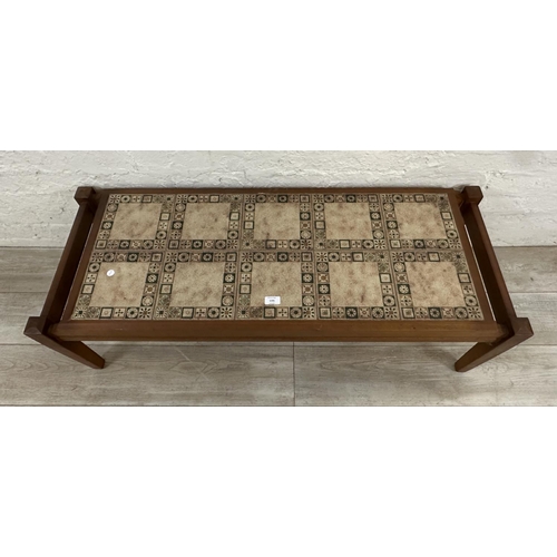 1191 - A mid 20th century teak and ceramic tile top coffee table - approx. 37cm high x 47cm wide x 122cm lo... 