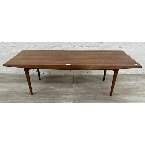 1195 - A mid 20th century Gordon Russell teak coffee table - approx. 40cm high x 45cm wide x 120cm long