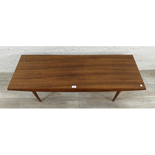 1195 - A mid 20th century Gordon Russell teak coffee table - approx. 40cm high x 45cm wide x 120cm long