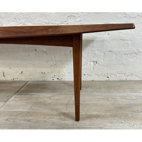 1195 - A mid 20th century Gordon Russell teak coffee table - approx. 40cm high x 45cm wide x 120cm long