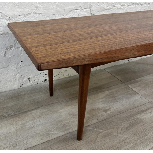 1195 - A mid 20th century Gordon Russell teak coffee table - approx. 40cm high x 45cm wide x 120cm long